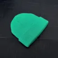 Bright green knitted beanie short skull cap hip hop winter warm woolen hat detail view - One Size / Grass Green
