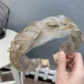 Detailed close-up of sparkling champagne organza braided headband decorated with rhinestones. - Chain Brown Coffee