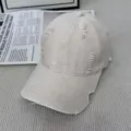 Détail de casquette de baseball beige délavée style vintage, surface en coton. - M (56-58cm) / Beige