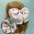 Pink satin bow hair clip, large elegant hair accessory with secure metal spring clip. - Duckbill Hair Clips / Pink