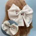 Korean style satin large bow hair clip, elegant champagne color variant with sturdy metal clip. - Duckbill Hair Clips / Beige