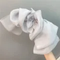 Detailed close-up view of a large grey organza layered bow hair clip showcasing rich texture. - Smoky Gray Bow