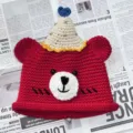 Handmade crochet bear beanie with cute party hat detail, cozy knit winter hat gift for best friends. - M (56-58cm) / Birthday Bear Knit Hat - Red