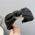 Black satin rhinestone embellished wide headband detail closeup product view chic hair accessory - Black