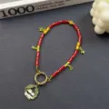 Cute Chinese style panda pendant phone charm, red bamboo beaded bag accessory detail view. - Red Bamboo Joint