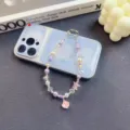 Beaded phone charm with starfish pendant, pearl and purple crystal wrist strap for cases. - Pink Purple