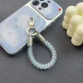 Short coiled phone lanyard clear bead charm strap for keys mobile phone bag pendant detail view - Blue