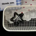 Detailed view of a chic black and white star hair clip with cute polka dots for stylish girls. - Star BB Clip / Black
