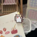 Cute meme cat hairpin light brown duckbill clip quirky bangs clip sweet girl hair accessory - Tongue Out Hair Clip