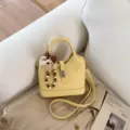 Korean style women yellow bucket bag, chic shoulder crossbody bag with cute bear charm. - With Charm / Yellow