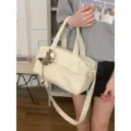 Borsa a tracolla morbida bianco sporco borsa a cuscino casual versatile da donna. - Con Ciondolo / Bianco