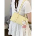 Minimalist yellow shoulder bag for women, chic PU baguette handbag, trendy daily casual crossbody. - With Pendant / Yellow