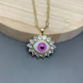 Exquisite gold paperclip chain necklace with a stunning pink evil eye pendant sparkling cubic zirconia. - Letter A