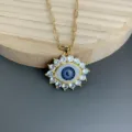 Detail view of the stylish evil eye pendant necklace featuring sparkling cubic zirconia stones. - Letter D