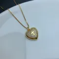 Gold heart necklace with sparkling rhinestones and cross pendant, elegant clavicle chain style. - Style D