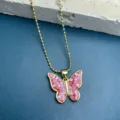 Red mosaic butterfly pendant necklace with gold ball chain, elegant clavicle chain jewelry detail. - Red