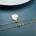 Gold heart pendant necklace with white mother of pearl and delicate beaded chain for women - S