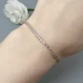 Exquisite crystal zircon tennis bracelet for women, elegant minimalist design detail view. - Gold-Purple