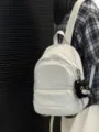 Casual minimalist white backpack detail showing daily fashion style and cute cat plush pendant. - With Charm / Off White