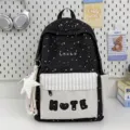 Zaino da scuola nero con stampa di stelle, tasca frontale e simpatico ciondolo per studenti - senza ciondolo / Nero