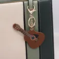 PU leather guitar keychain bag pendant, cute music instrument charm for keys and bags. - Guitar Shape - Gold Chain Buckle