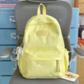 Light yellow school backpack with colorful bow embroidery sweet casual daily use travel bag - Yellow with Cloud Pendant