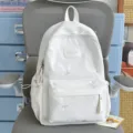 Süßer weißer Damen Rucksack aus Segeltuch mit bunter Schleifenstickerei für Reise und Schule. - Weiß