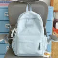 Light blue backpack, colorful bow embroidery, cute school bag for girls, daily travel style. - Blue with Pendant