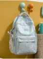 Light blue cartoon print casual backpack variant, stylish and lightweight for daily use. - Silver Bead Bowknot / Blue