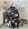 Zaino scolare tie dye nero e bianco per adolescenti, elegante borsa multitasche - Palla di Pelo Bianca Con Gambe Lunghe / Nero