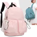 Mochila de estudiante ligera y bonita con bolsillos con cordón y colgante de encaje para clases. - Lazo de Perlas / Rosa