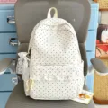 White polka dot canvas backpack with cute lace ruffles, casual school bag for daily use. - With Charm / White