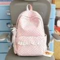 Pink polka dot backpack with sweet lace trim, cute bow style student school bag for daily use. - With Charm / Pink
