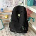 Casual black backpack with sweet lime green clover embroidery, perfect for daily and school use. - No Pendant / L / Black