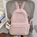 Cute pink backpack with subtle bear embroidery, sweet Japanese style school bag for women. - With Charm / Pink