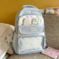 Cute light blue polka dot backpack with bunny ears and bows, perfect for school and daily use. - Backpack And Plush Pendant / Blue