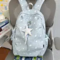 Lichtblauwe casual rugzak met stipjes en schattig sterhangertje voor dagelijks gebruik. - Met Hanger / Blauw