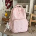 Pink star print school backpack with cute lace trim and roomy compartments for daily use. - With Charm / Pink