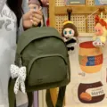 Green minimalist mini backpack for women, casual cute daily daypack with bowknot charm. - With Charm / Army Green