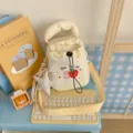 Japanese dopamine plaid crossbody bag with cute strawberry embroidery and star pendant. - With Pendant / Cream