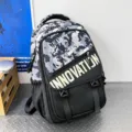 Camouflage tactical backpack for students, stylish school bag with front pockets. - Black-Blue Camo