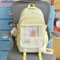 Mochila japonesa escolar amarillo claro con ribete de encaje, ventana transparente y bordado. - Con Colgante / Amarillo