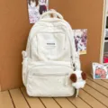 Korean sweet polka dot girls backpack fresh versatile casual school bag for students - With Pendant / White