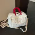 Borsa da viaggio in tela bianca con ricamo di fiocco rosso elegante borsa a tracolla casual - Bianco avorio