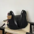 Black suede leather convertible backpack shoulder bag with cute bear pendant and flap. - Black