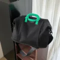 Black travel duffel bag with green handles, large capacity gym bag and weekender bag for travel. - Black