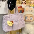 Detail view of Korean sweet style purple drawstring tote bag with cute cat plush pendant. - With Pendant / Purple