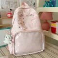 Pink ita backpack with transparent front pocket and star print for ACG fans and DIY doll display. - With Cat Pendant / Pink