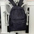 Classic dark tie-dye backpack with front pocket and large capacity for daily commute and school. - Black
