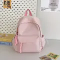 Minimalist pink backpack for women and students, casual stylish daily daypack with front pocket. - Pink Small